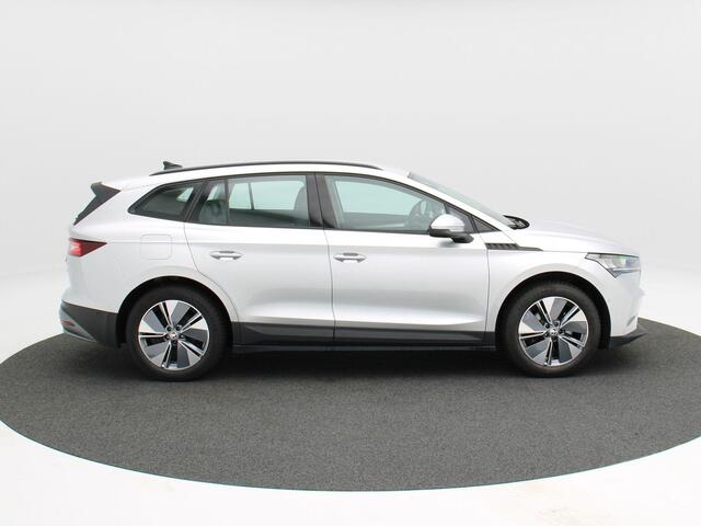 Skoda Enyaq iV 60 180 Pk | Stoelverwarming | Trekhaak | Navigatie | Cruise Control | CarPlay | Climatronic | Camera | 19 Inch | 74.277 Km !!