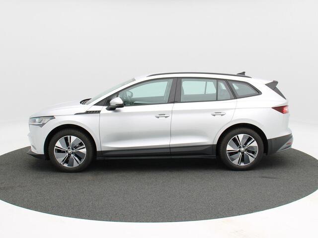 Skoda Enyaq iV 60 180 Pk | Stoelverwarming | Trekhaak | Navigatie | Cruise Control | CarPlay | Climatronic | Camera | 19 Inch | 74.277 Km !!
