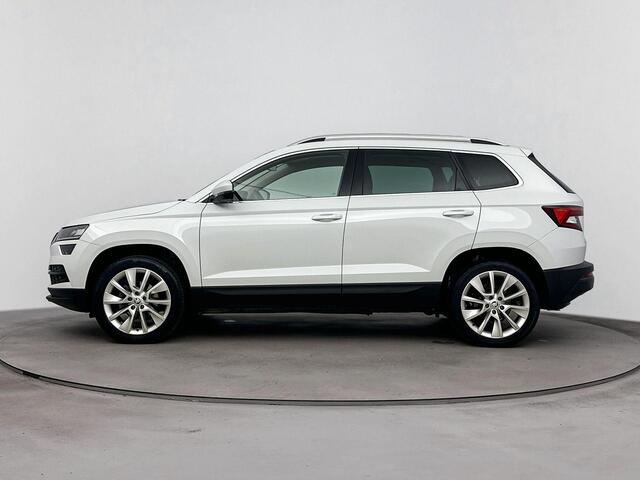 Skoda Karoq 1.0 TSI Style | panorama dak | Cruise control | Navi | Climate Control | Elect.verstelbare stoelen met geheugen | Camera