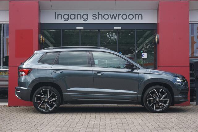 Skoda Karoq 1.5 TSI ACT Sportline Business | Origineel NL | Automaat | Winter Pakket | Virtual Cockpit | ACC | Trekhaak | Camera |