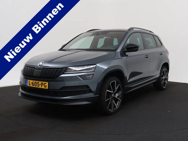 Skoda Karoq 1.5 TSI ACT Sportline Business | Automaat | Apple Carplay / Android Auto | Navigatie | Achteruitrijcamera | Virtual Cockpit | Verwarmde Stoelen | Adaptieve Cruise Control | Elektrische Achterklep | Canton Audio | Climate C