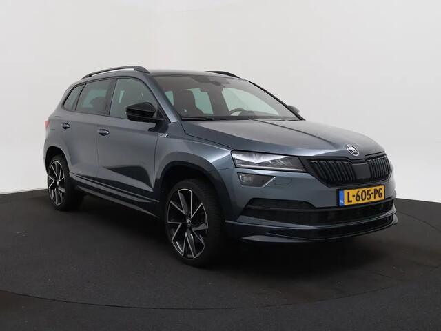 Skoda Karoq 1.5 TSI ACT Sportline Business | Automaat | Apple Carplay / Android Auto | Navigatie | Achteruitrijcamera | Virtual Cockpit | Verwarmde Stoelen | Adaptieve Cruise Control | Elektrische Achterklep | Canton Audio | Climate C