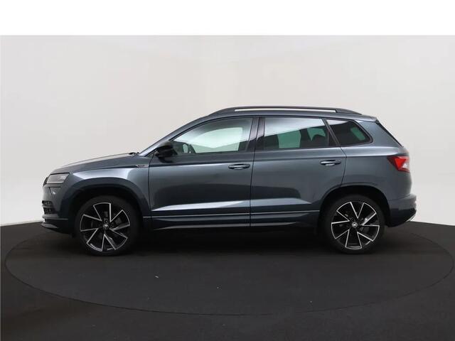 Skoda Karoq 1.5 TSI ACT Sportline Business | Automaat | Apple Carplay / Android Auto | Navigatie | Achteruitrijcamera | Virtual Cockpit | Verwarmde Stoelen | Adaptieve Cruise Control | Elektrische Achterklep | Canton Audio | Climate C