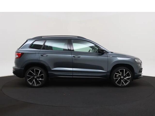 Skoda Karoq 1.5 TSI ACT Sportline Business | Automaat | Apple Carplay / Android Auto | Navigatie | Achteruitrijcamera | Virtual Cockpit | Verwarmde Stoelen | Adaptieve Cruise Control | Elektrische Achterklep | Canton Audio | Climate C