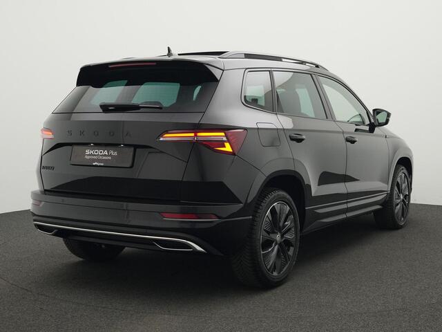 Skoda Karoq 1.5 TSI ACT 150 pk DSG Sportline Business | Panoramadak | Leder | Geheugenstoelen | Adaptief onderstel | Matrix LED | Stuur-/achterbankverwarming