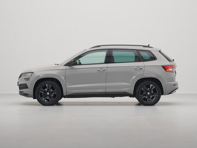 Skoda Karoq 1.5 TSI ACT 150pk DSG Sportline Business Navigatie CantonSound Stoelverwarming Camera Carplay Sideassist