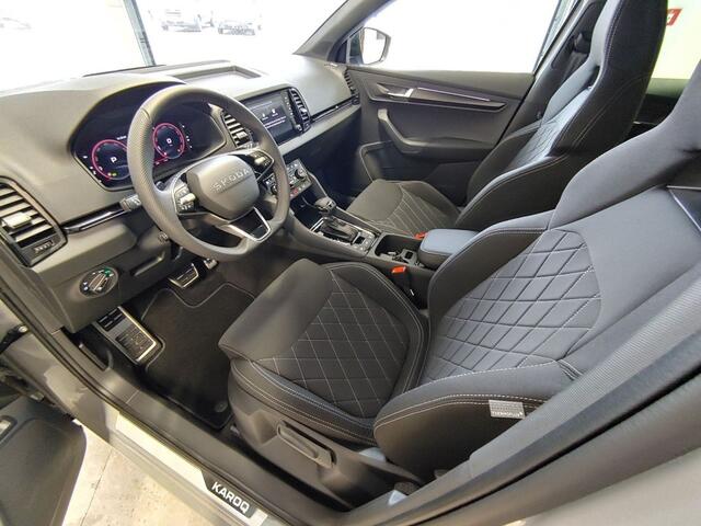 Skoda Karoq 1.5 TSI DSG SPORTLINE TREKHAAK/CAMERA/CARPLAY/ACC/STOELVERW/E-KLEP