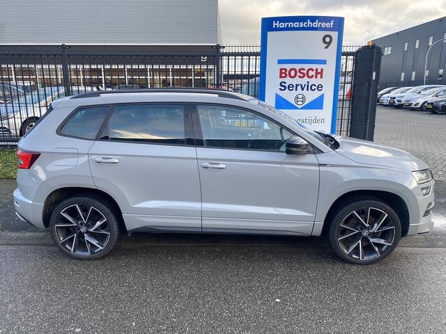 Skoda Karoq 1.5 TSi 150pk ACT Sportline Business met o.a. stoel-/stuurverwarming, LED, 19", virtual cockpit, etc.