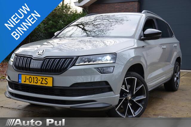 Skoda Karoq 1.5 TSI ACT Sportline Business Automaat/Navi/Audio installatie premium/Led/Pdc/Ecc/Stuur&Stoelverwarming/Virtual Cockpit/Achteruitrijcamera/Cr-Control adaptief/Canton/Privacy-Glass/19-Inch Lmv/Trekhaak wegklapbaar