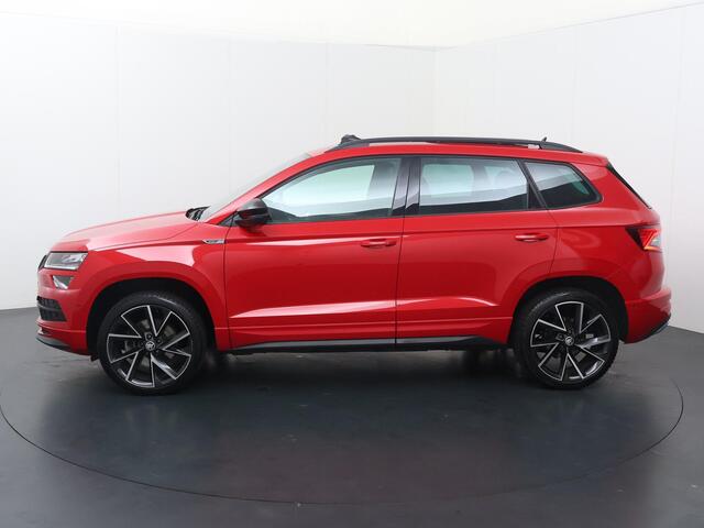 Skoda Karoq 1.5 TSI ACT Sportline Business | 150 PK | Automaat | Trekhaak wegklapbaar | Panoramadak | Navigatiesysteem | Verwarmde voorstoelen |
