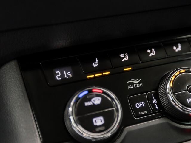 Skoda Karoq 1.5 TSI ACT Sportline Automaat (APPLE CARPLAY, KEYLESS ENTRY, STOELVERWARMING, SPORTSTOELEN, GETINT GLAS, WITTE STIKSELS, CLIMATE CONTROL, BLUETOOTH, NIEUWSTAAT)