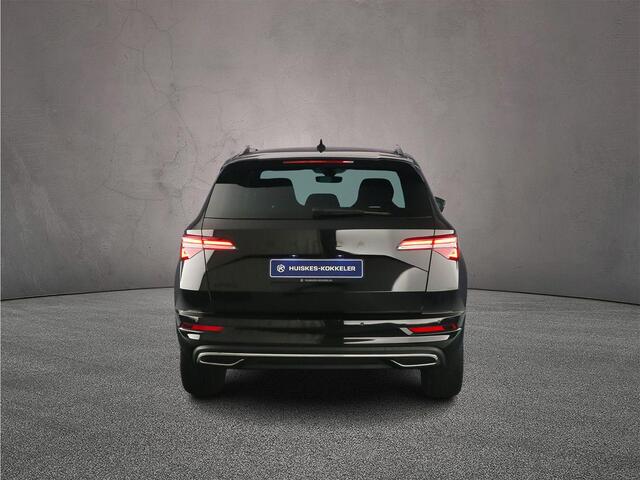 Skoda Karoq Sportline Business 1.5 TSI 150pk DSG Automaat Trekhaak, Adaptive cruise control, LED matrix koplampen, Navigatie, Achteruitrijcamera, Elektrische achterklep