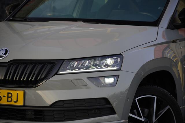 Skoda Karoq 1.5 TSI ACT 150PK! Automaat Sportline Business BJ2022 Lmv 19" | Led V+A | Pdc | Navi | Keyless entry | Elek. trekhaak | Verwarmd voorruit | Achteruitrijcamera | App-Connect | Virtual cockpit | Canton Audio | Verwarmde voorstoelen/stuurwiel | Zwarte hemel