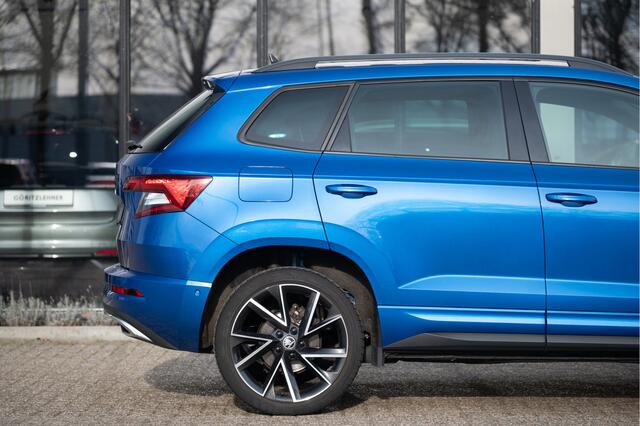 Skoda Karoq 1.5 TSI ACT Sportline Business | Trekhaak | Adapt. Cruise | CANTON | Camera | 19" | Winterpakket