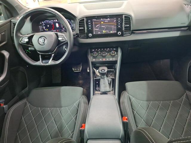 Skoda Karoq 1.5 TSI ACT Sportline Business Panorama Camera Stoel/Stuurverwarming Canton Sound Ozon en 1x velg miss Kofferklep schuren