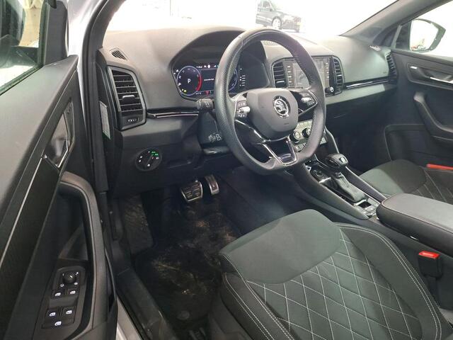 Skoda Karoq 1.5 TSI ACT Sportline Business Panorama Camera Stoel/Stuurverwarming Canton Sound Ozon en 1x velg miss Kofferklep schuren