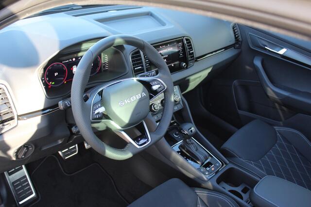 Skoda Karoq 1.5 TSI ACT Sportline Business / PANODAK / NAVI/ APP.Connect / Elektr. Trekhaak / CAMERA / 19"LMV