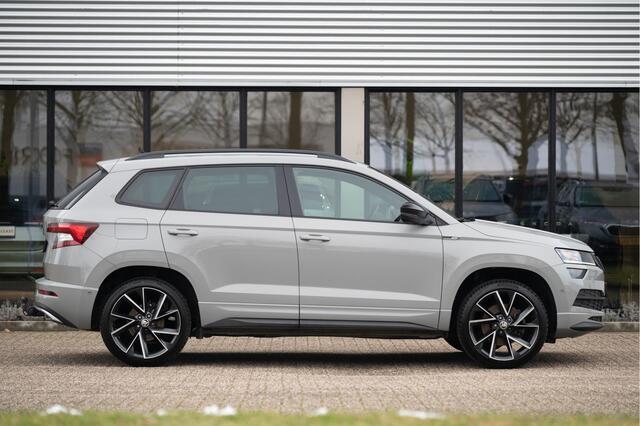 Skoda Karoq 1.5 TSI ACT Sportline Business | Trekhaak | Adapt. Cruise | Camera | 19" | Winterpakket