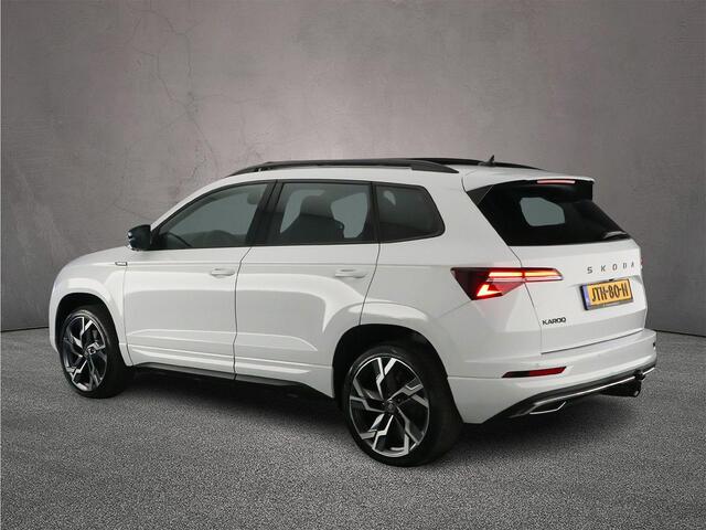 Skoda Karoq Sportline Business 1.5 TSI 150pk DSG Automaat Trekhaak, Panoramadak, CANTON audio, Adaptive cruise control, Elektrische achterklep, LED matrix koplampen