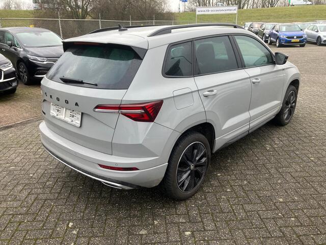 Skoda Karoq 1.5 TSI ACT 150pk DSG Sportline Business Camera digitaal display Matrix LED privacy glass