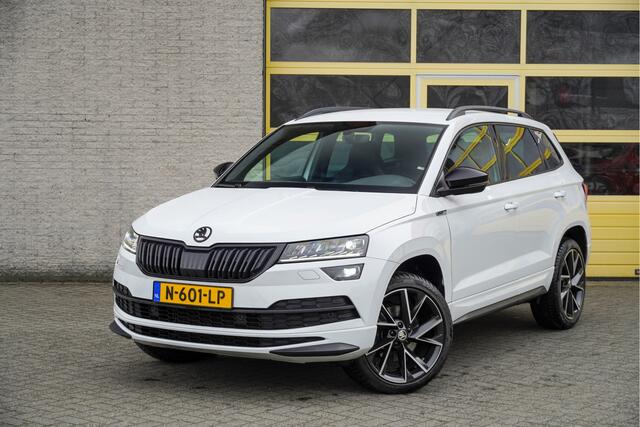 Skoda Karoq 1.5 TSI ACT 150PK! Automaat Sportline Business BJ2021 Lmv 19" | Led V+A | Pdc | Navi | Keyless entry | Elek. achterklep | Achteruitrijcamera | App-Connect | Virtual cockpit | Canton audio | | Sportstoelen | Verwarmde voorstoelen/stuurwiel | Zwarte hemel