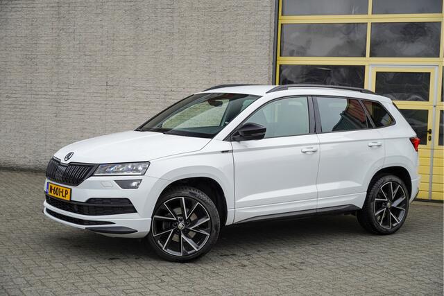 Skoda Karoq 1.5 TSI ACT 150PK! Automaat Sportline Business BJ2021 Lmv 19" | Led V+A | Pdc | Navi | Keyless entry | Elek. achterklep | Achteruitrijcamera | App-Connect | Virtual cockpit | Canton audio | | Sportstoelen | Verwarmde voorstoelen/stuurwiel | Zwarte hemel