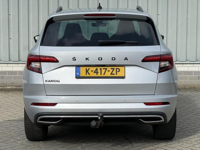 Skoda Karoq 1.5 TSI ACT Sportline Business / Nederlandse Auto / Dealer Onderhouden / All Seasonbanden / Trekhaak 1500 KG / Navigatie / Stoel- en Stuurverwarming / Adaptive Cruise Control / Voorruitverwarming / Climate Control /