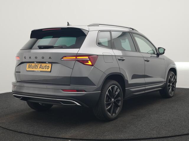 Skoda Karoq 1.5 TSI ACT Sportline Business DSG 150pk | Adaptive Cruise | Camera | Matrix LED | RS Sportstoelen Verwarmd | 18"L.M | Adaptive Onderstel | Keyless | Sfeerverlichting | Apple Carplay | Virtual | Navigatie | DAB |