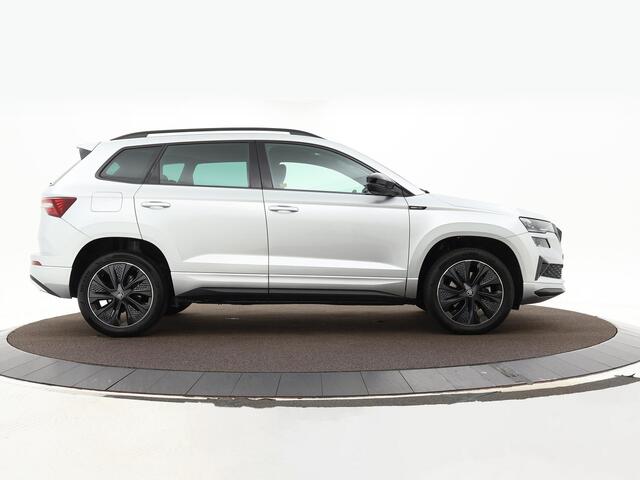 Skoda Karoq 1.5TSI/150PK DSG ACT Sportline · Camera · Elek. Trekhaak · Elek. Achterklep · Apple/Android Car Play · Navigatie · 18'' Inch · Garantie t/m 27-02-2029 of 60.000km