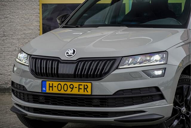 Skoda Karoq 1.5 TSI ACT 150PK! Automaat Sportline Business BJ2020 Lmv 18" | Led V+A | Pdc | Keyless entry | Verwarmde voorruit | Achteruitrijcamera | App-Connect | Navi | Virtual cockpit | Dashboard verlichting | Verwarmde voorstoelen | Zwarte hemel