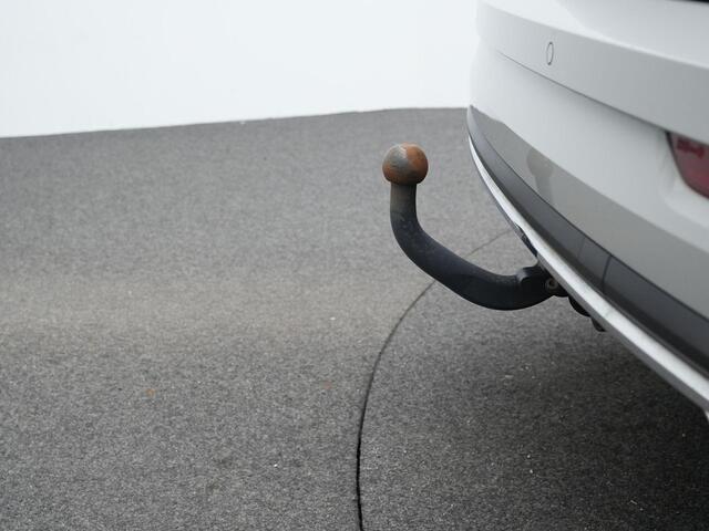 Skoda Karoq 1.5 TSI 150 pk DSG ACT Sportline Business | Trekhaak | Achteruitrijcamera | Adaptive Cruise | Stoelverwarming | Navigatie | Side Assist