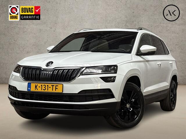 Skoda Karoq 1.5 TSI ACT Deluxe 150Pk Automaat (PANORAMADAK, APPLE CARPLAY, LEDER, ZWART HEMEL, CANTON AUDIO, STOELVERWARMING, ADAPTIVE CRUISE, KEYLESS, GETINT GLAS, CAMERA, NIEUWSTAAT)
