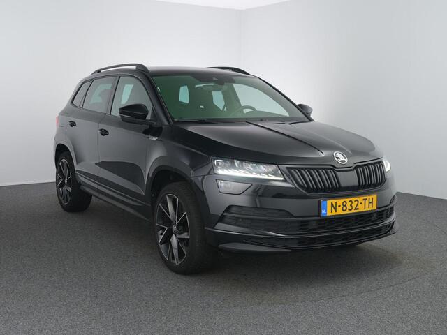 Skoda Karoq 1.5 TSI ACT Sportline Business | Zwenkhaak | Winterpakket | Canton | ACC | Dodehoeksensor |