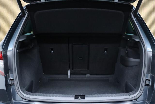 Skoda Karoq 1.5 TSI ACT Sportline Business DSG | Adaptive-cruise | Trekhaak | Camera | Clima | Stuur & Stoelverwarming | Navigatie | Virtual-Cockpit | Apple Carplay & Android Auto | Elek. Achterklep | Keyless | Dodehoekdetectie