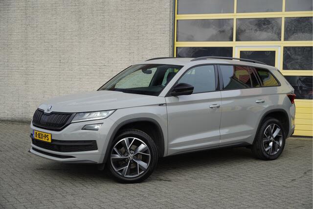 Skoda Kodiaq 1.5 TSI 150PK! Automaat Sportline Business BJ2021 Lmv 19" | Led V+A | Pdc | Keyless entry | Elek. trekhaak | Achteruitrijcamera | App-Connect | Navi | Virtual cockpit | Dashboard verlichting | Elek. Be stoel+Mem | Verwarmde voorstoelen | Zwarte hemel