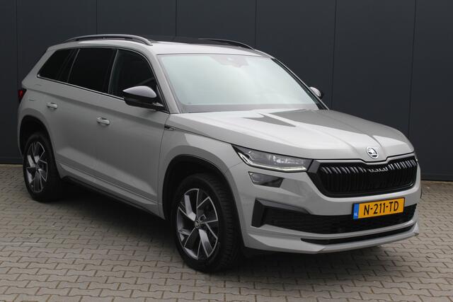 Skoda Kodiaq 1.5 TSI Sportline Business 7p. | Incl. 12 maanden garantie | Pano | Adaptive cruise | Zwarte hemel | Stoel/stuur verwarming | LED | Dodehoek detector | Lane assist | Schakelflippers | Navi | Apple Carplay | 19" LMV | Camera | PDC V+A | Virtual cockpit | B