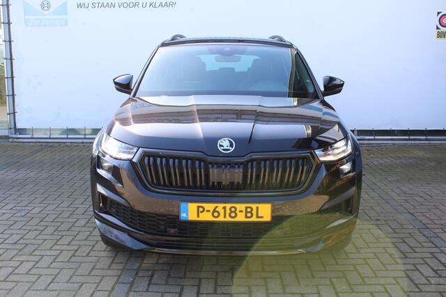 Skoda Kodiaq 1.5 TSI Sportline Business 7p. | Incl. 12 maanden Garantie | Wegklapbare trekhaak | Elektrisch verstelb. bestuurdersstoel met geheugen | Elektrisch kofferbakklep | Apple CarPlay | Adaptive cruise | Stoel/stuur verwarming | Achteruitrij camera | Parkeersen