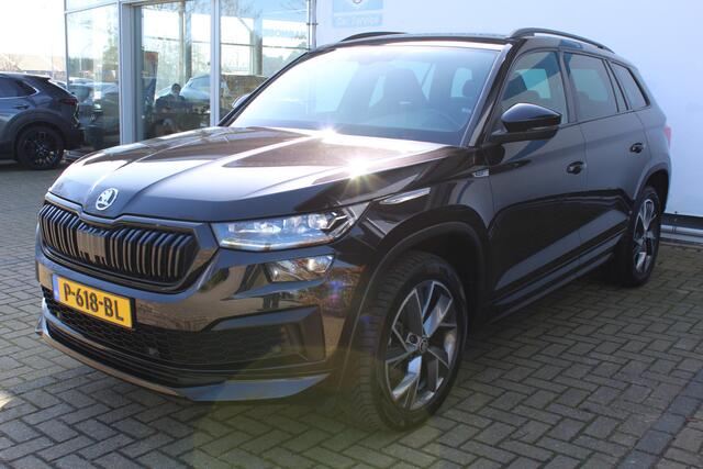 Skoda Kodiaq 1.5 TSI Sportline Business 7p. | Incl. 12 maanden Garantie | Wegklapbare trekhaak | Elektrisch verstelb. bestuurdersstoel met geheugen | Elektrisch kofferbakklep | Apple CarPlay | Adaptive cruise | Stoel/stuur verwarming | Achteruitrij camera | Parkeersen