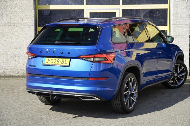 Skoda Kodiaq 1.5 TSI 150PK! Automaat Sportline Business BJ2020 Lmv 20" | Led V+A | Pdc | Keyless entry | Trekhaak afneembaar | Elek. achterklep | Achteruitrijcamera | App-Connect | Navi | Virtual cockpit | Dashboard verlichting | Sportstoelen/Sportstuur | Zwarte hemel