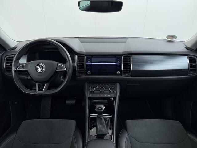 Skoda Kodiaq 1.5TSI Autom. Trekhaak Adap.Cruise Panoramadak Virtual Cockpit Camera Canton®-Audio Stoelverwarming 3-Zone Ecc Navi Apple Carplay Android Auto Pdc Business Ed. Led Lmv Bluetooth Isofix Regen-Lichtsensor 1.800KG Trekgewicht Zeer Complete Auto
