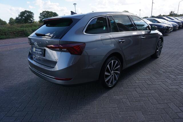 Skoda OCTAVIA Combi 1.4 TSI iV PHEV STYLE LUXE KEURIGE NETTE STAAT! CAMERA DIGITALE COCKPIT STOEL+STUURVERWARMING ADAPTIEVE CRUISE ANDROID/APPLECARPLAY NAVI ELECTR.KLEP 1/2LEDER FULL LED KEYLESS ENZ...