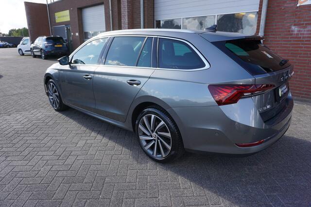 Skoda OCTAVIA Combi 1.4 TSI iV PHEV STYLE LUXE KEURIGE NETTE STAAT! CAMERA DIGITALE COCKPIT STOEL+STUURVERWARMING ADAPTIEVE CRUISE ANDROID/APPLECARPLAY NAVI ELECTR.KLEP 1/2LEDER FULL LED KEYLESS ENZ...