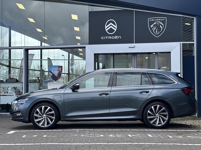 Skoda OCTAVIA Combi 1.4 TSI iV PHEV Business Edition Plus | Adaptive Cruise Control | Stoel-/Stuurverwarming | Elektrische Stoelen met geheugen | Climate Control | Parkeercamera/-sensoren | Apple Carplay/Android Auto | Elektrische kofferbak | Keyless Entry/Start | Full