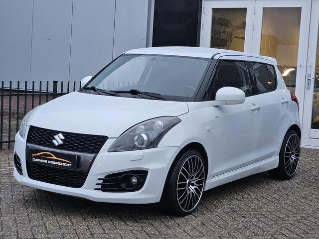 Suzuki SWIFT 1.6 Sport XENON|KEY LESSGO|CRUISE CONTROL|ECC/AIRCO|BLUE TOOTH TELEFONIE|USB|STOELVERWARMING|17 INCH Maandag tot Vrijdag geopend van 09.00 uur tot 20.00 uur en Zaterdag van 09.00 tot 18.00 uur