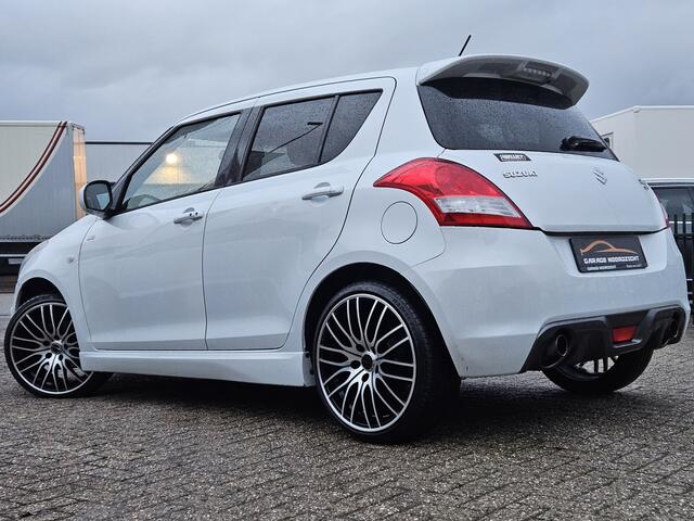 Suzuki SWIFT 1.6 Sport XENON|KEY LESSGO|CRUISE CONTROL|ECC/AIRCO|BLUE TOOTH TELEFONIE|USB|STOELVERWARMING|17 INCH Maandag tot Vrijdag geopend van 09.00 uur tot 20.00 uur en Zaterdag van 09.00 tot 18.00 uur