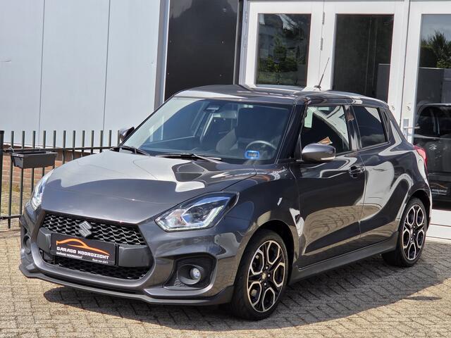 Suzuki SWIFT 1.4 Sport Smart Hybrid NAVIGATIE|CAMERA|CRUISE CONTROL|KEY LESSGO & ENTRY|GETINT GLAS|17 INCH|1E EIGENAAR|DEALER ONDERHOUDEN Maandag tot Vrijdag geopend van 09.00 tot 20.00 uur en Zaterdag van 09.00 tot 18.00 uur