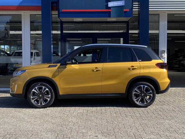 Suzuki VITARA 1.4 Boosterjet Comfort Smart Hybrid / NL-Auto / 9900 KM! / 1e-Eigenaar / Dealer-Onderhouden / Afneembare-Trekhaak / Half-Alcantara Half-Leder / Stoelverwarming / Adaptieve Cruise-Control / Apple-Carplay & Android-Auto / DAB Radio-Bluetooth / Navi / Climat