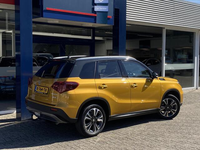 Suzuki VITARA 1.4 Boosterjet Comfort Smart Hybrid / NL-Auto / 9900 KM! / 1e-Eigenaar / Dealer-Onderhouden / Afneembare-Trekhaak / Half-Alcantara Half-Leder / Stoelverwarming / Adaptieve Cruise-Control / Apple-Carplay & Android-Auto / DAB Radio-Bluetooth / Navi / Climat