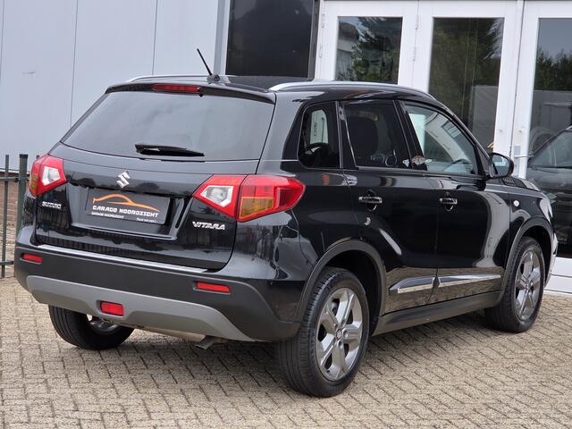 Suzuki VITARA 1.6 120pk Exclusive XENON|CRUISE CONTROL|ECC/AIRCO|BLUE TOOTH TELEFONIE|USB|STOELVERWARMING|TREKHAAK AFNEEMBAAR|17 INCH Maandag tot Vrijdag geopend van 09.00 uur tot 20.00 uur en Zaterdag van 09.00 tot 18.00 uur