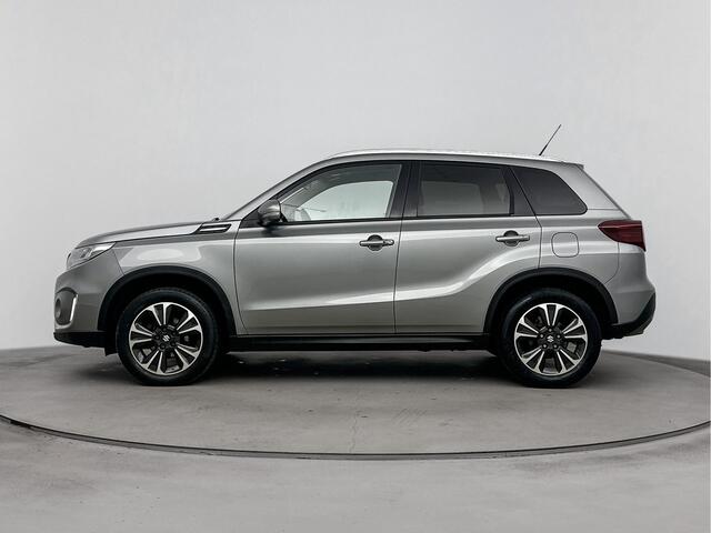 Suzuki VITARA 1.4 Boosterjet Style Smart Hybrid Panoramadak! | Metaallak | Stoelverwarming | Parkeersensoren | LM-Velgen | Donker Getinte Achterruiten |